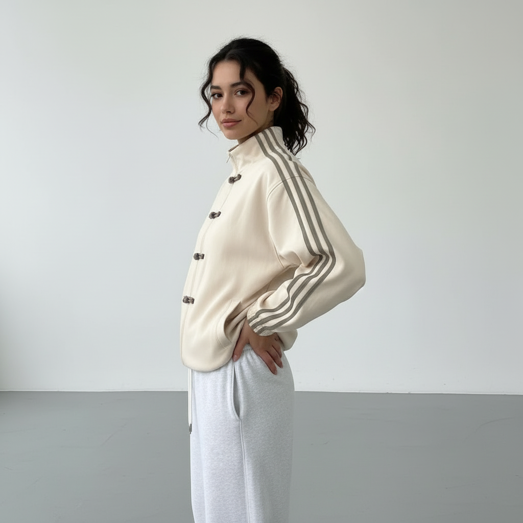 Women retro velour track jacket with contrast sleeve stripes and button closure