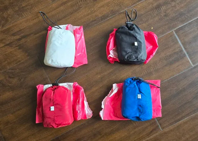 Women men lightweight packable waterproof windbreaker rain jacket UPF 50 sun protection