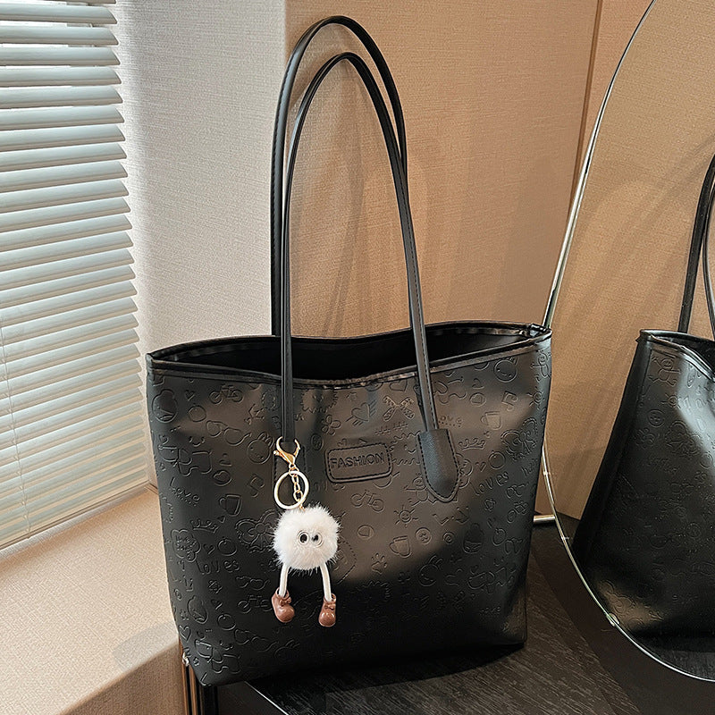 Women's Handbag | Elegant Design, Decorative Pendants