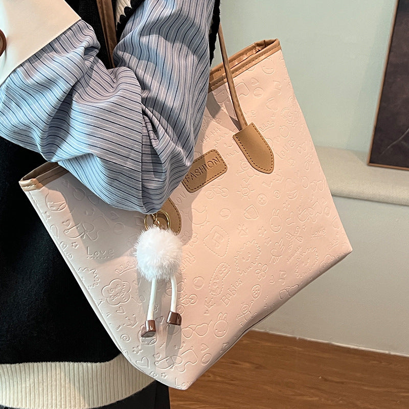 Women's Handbag | Elegant Design, Decorative Pendants