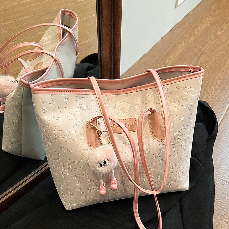 Women's Handbag | Elegant Design, Decorative Pendants