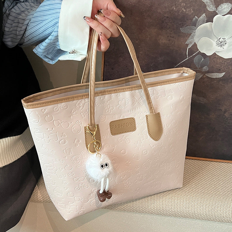 Women's Handbag | Elegant Design, Decorative Pendants