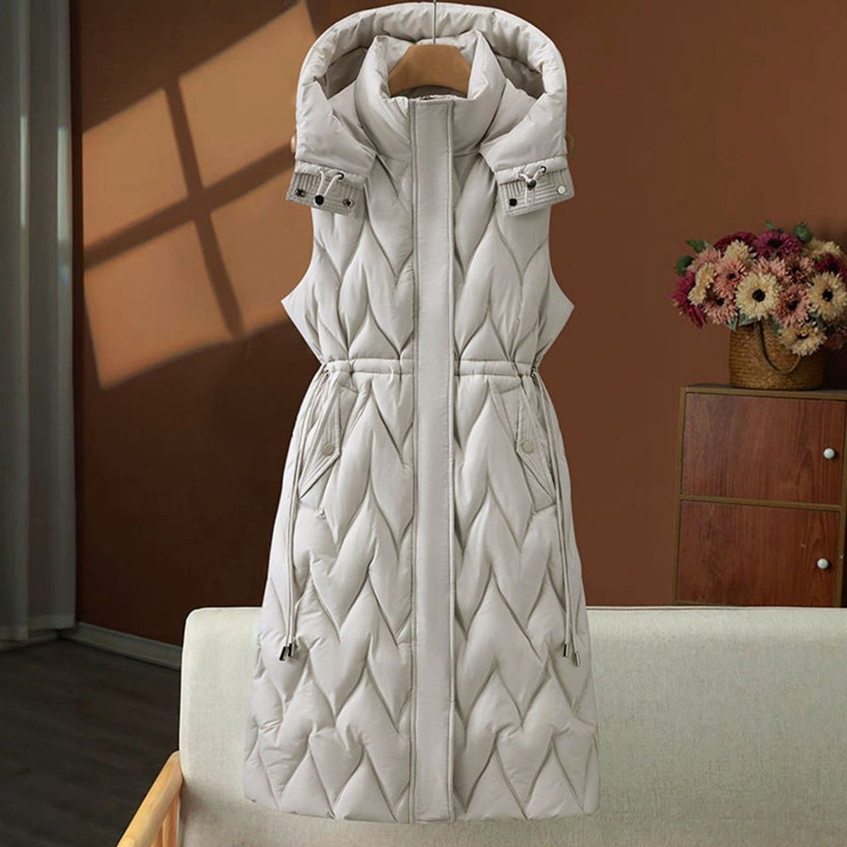 Women long quilted hooded gilet with drawstring waist in maxi length
