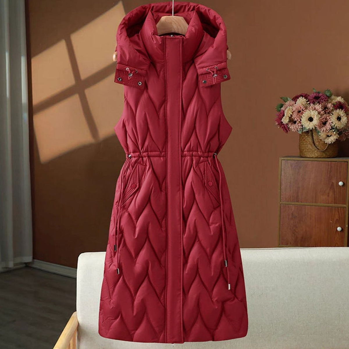 Women long quilted hooded gilet with drawstring waist in maxi length