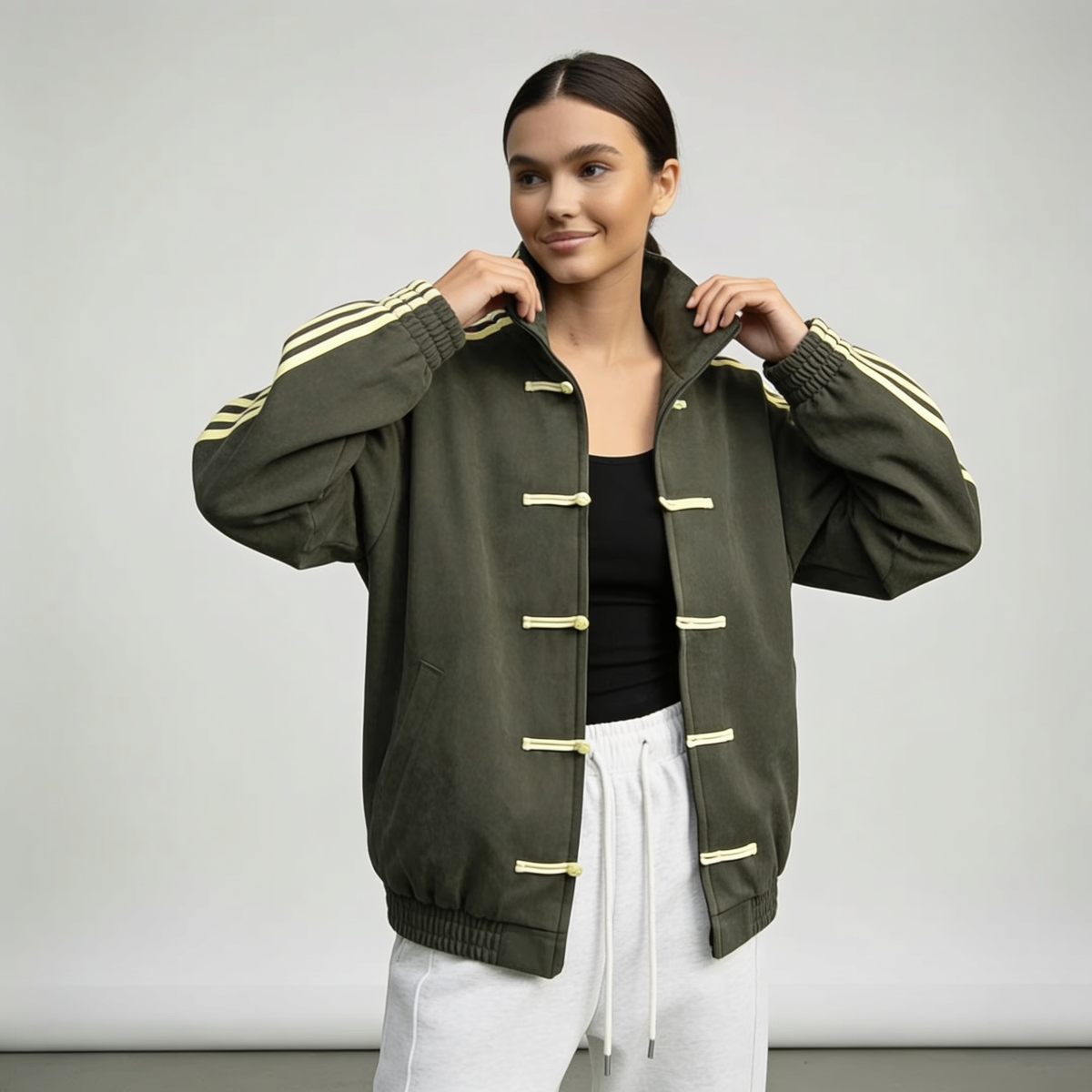 Women retro velour track jacket with contrast sleeve stripes and button closure
