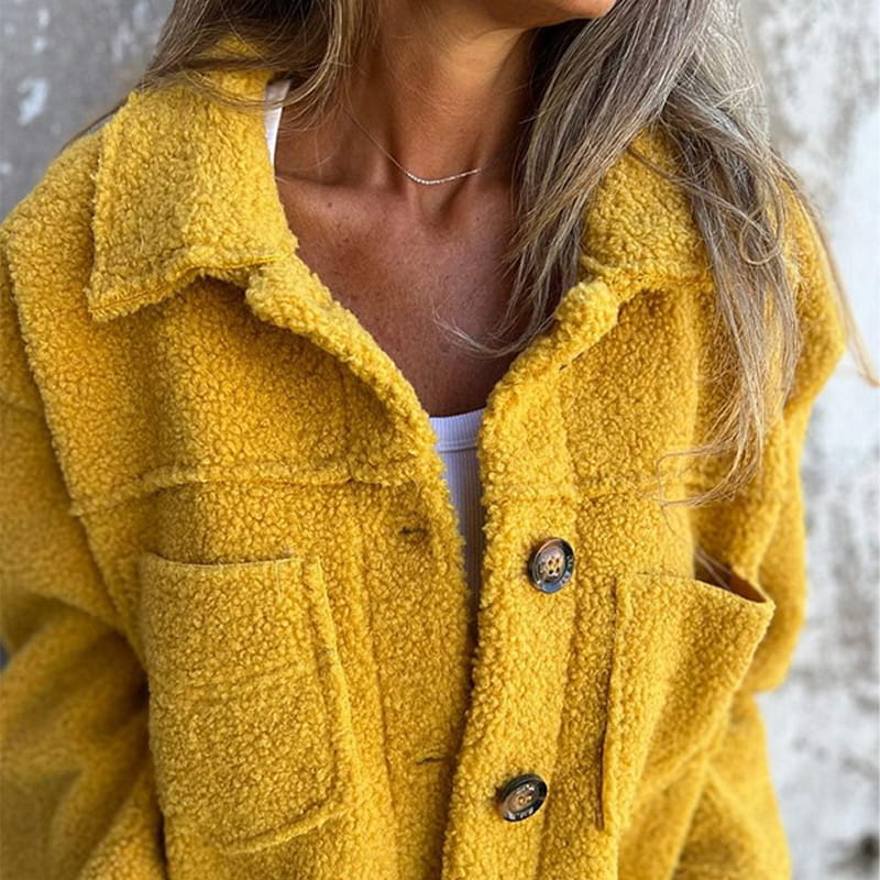 Women straight cut midlength coat with lapel collar and button front