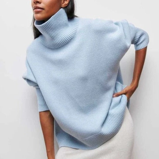 Oversized turtleneck sweater with ribbed cuffs and high collar