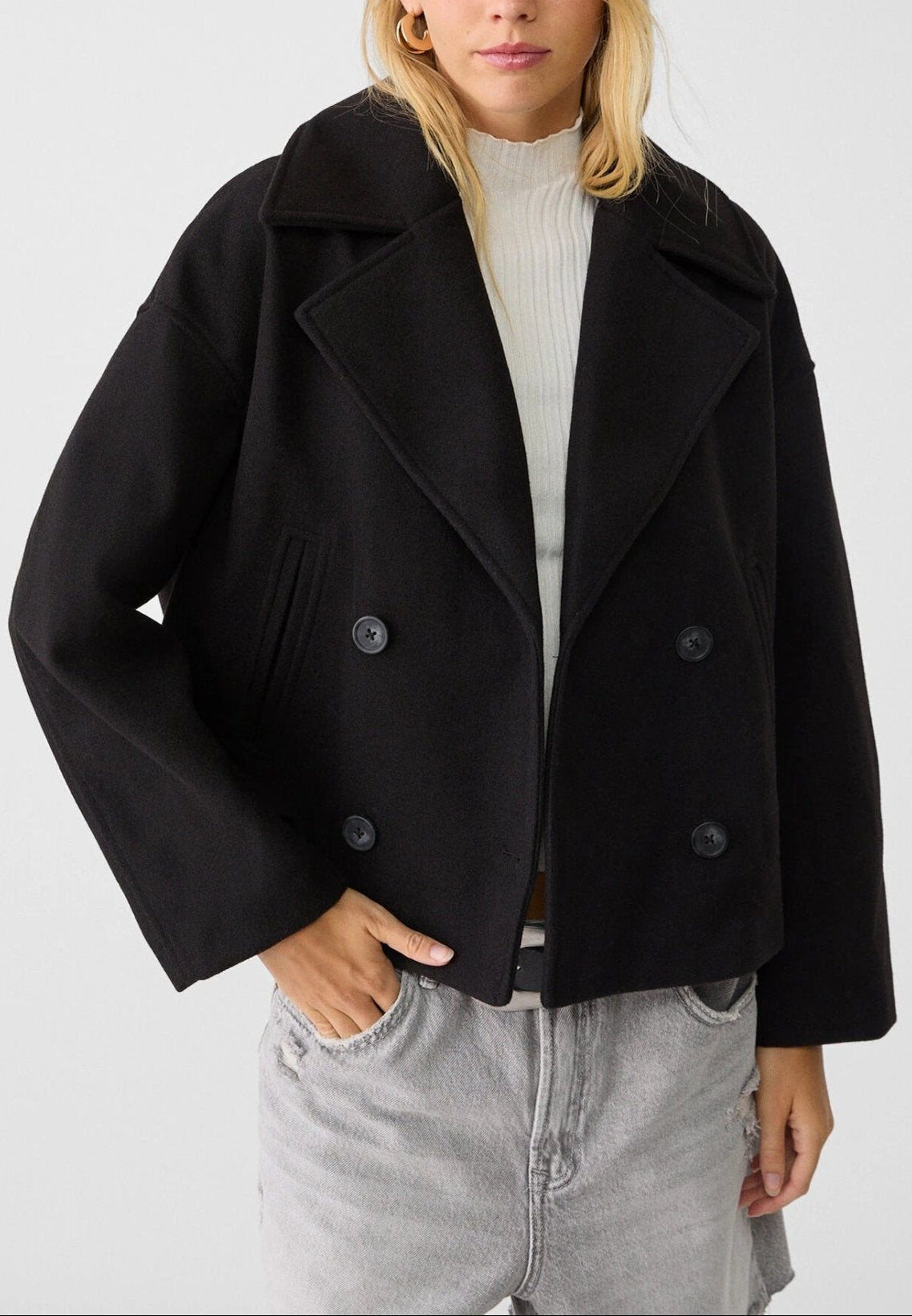 Women tailored short jacket clean lines modern structured silhouette