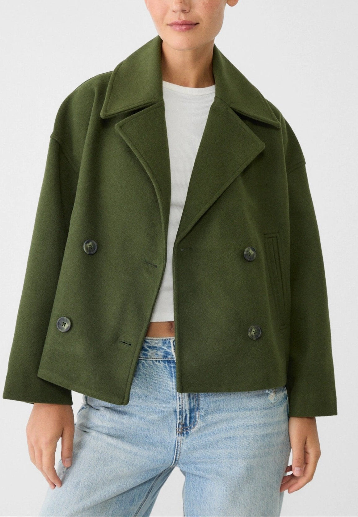 Women tailored short jacket clean lines modern structured silhouette