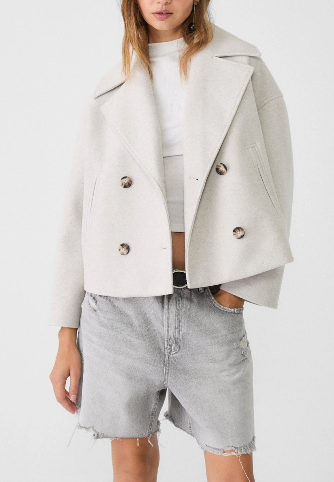 Women tailored short jacket clean lines modern structured silhouette
