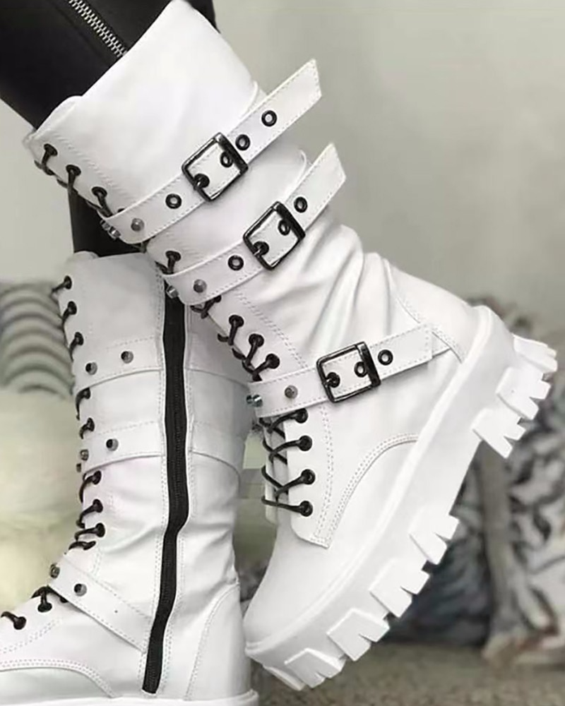 Women platform boots with buckle detail and side zip