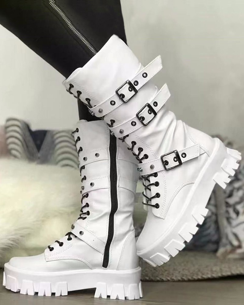 Women platform boots with buckle detail and side zip